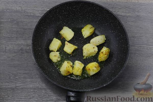 Рыба, тушенная с тыквой и сметаной